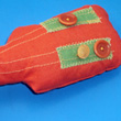 Una chitarra giocattolo, in stoffa