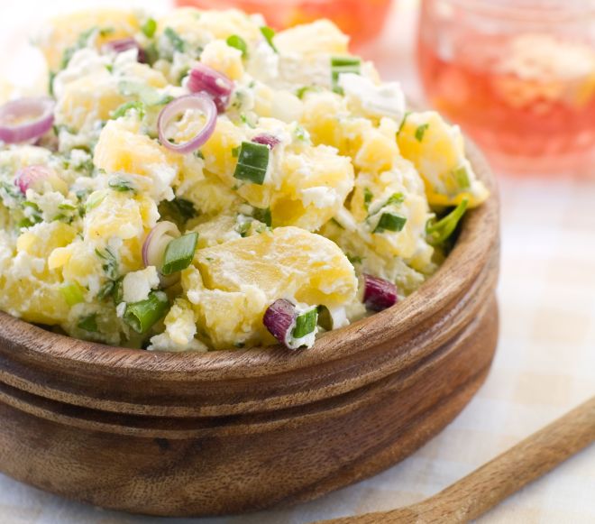 Potato salad with mayonnaise and spring onion, selective focus